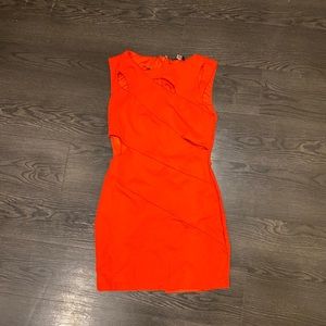 Fitted dress with opening on sides
